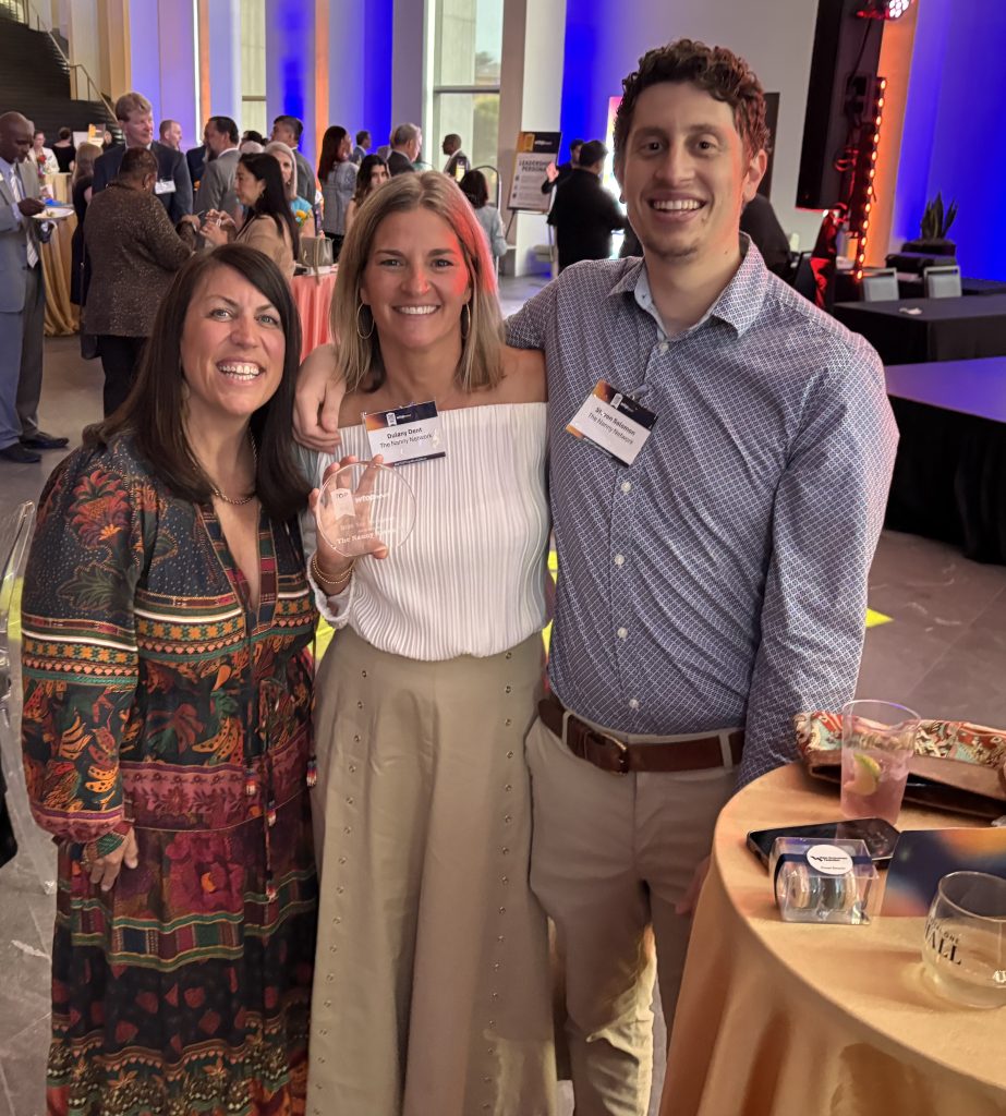 The Nanny Network team celebrating with award at the Washington Top Workplaces Awards event on June 18, 2026